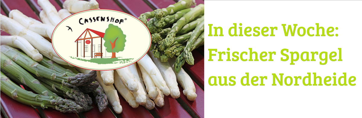 KI generiert: Frischer grüner und weißer Spargel auf rotem Tisch. 

Text: "In dieser Woche: Frischer Spargel aus der Nordheide"